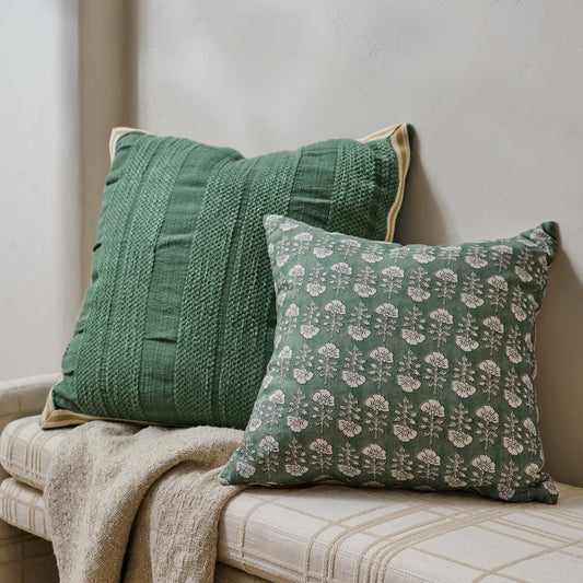 Flora Dusty Green Printed Pillow shown on bench with another green pillow