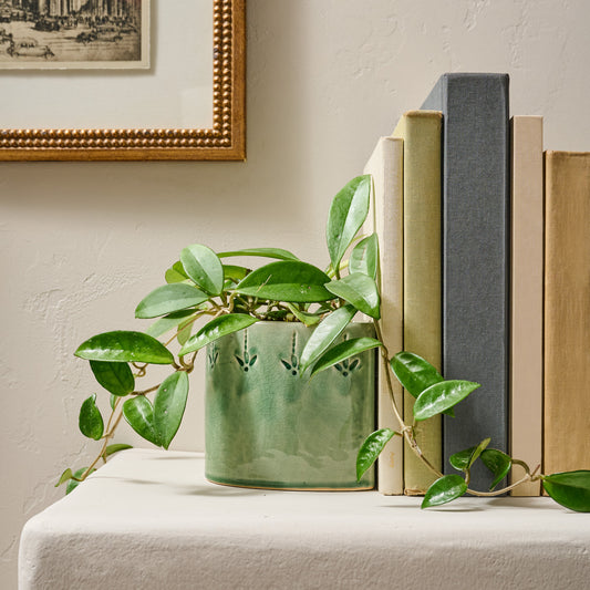 Floral Debossed Bookend shown with potted plant inside