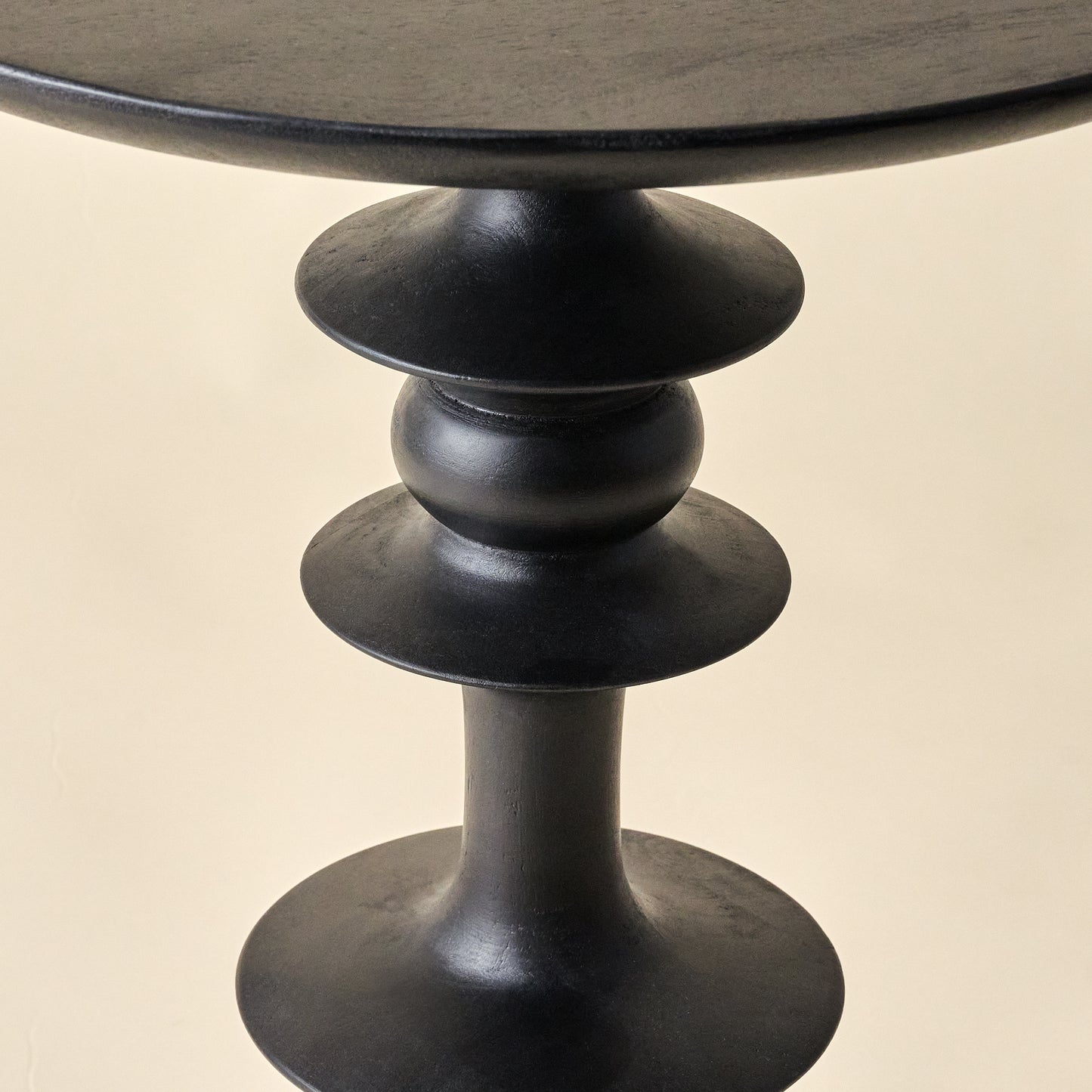 Enzo Turned Wood Side Table in color black close up detail