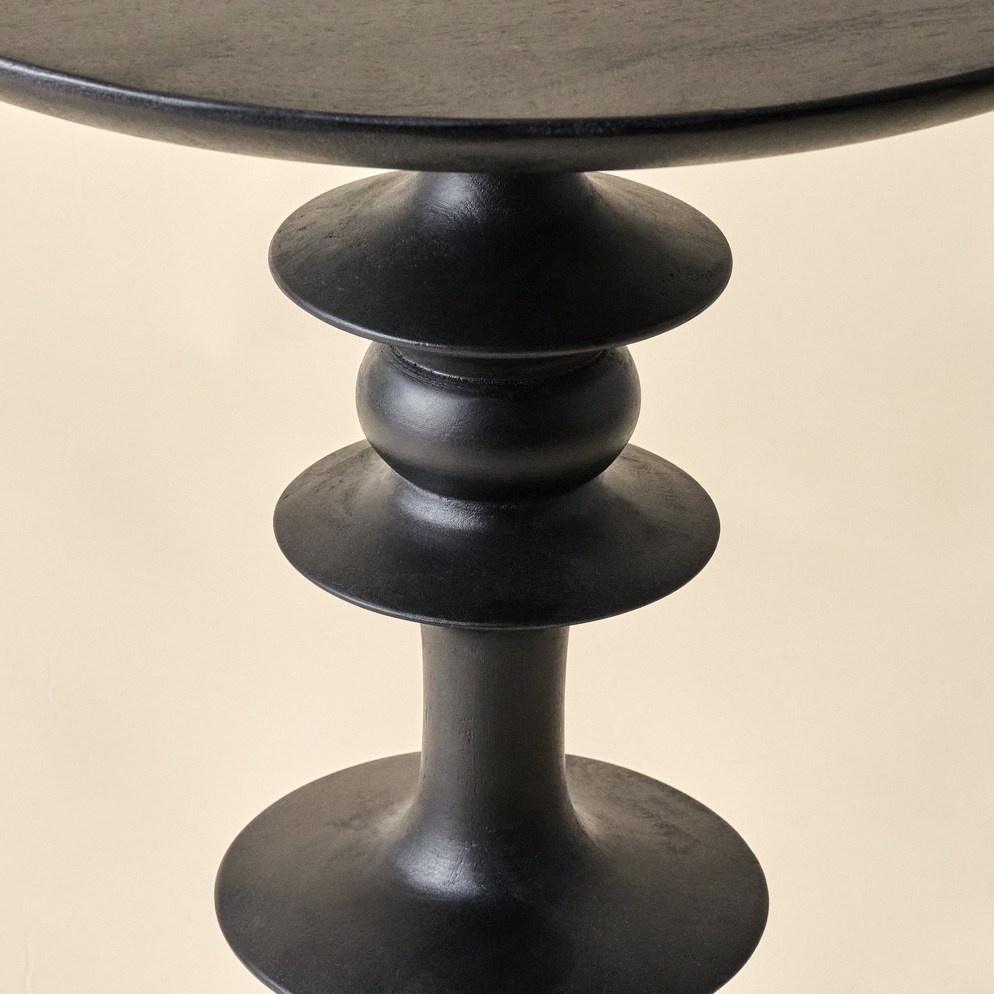 Enzo Turned Wood Side Table in color black close up detail