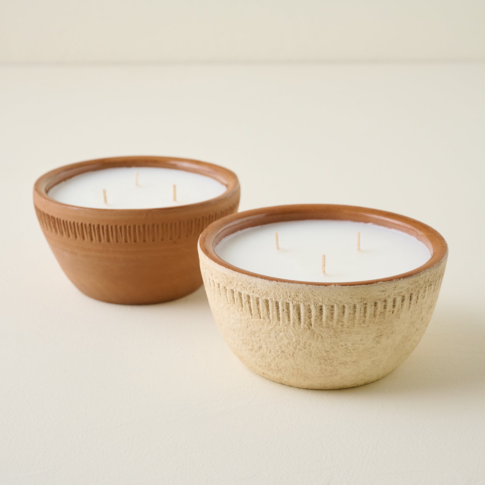 Magnolia Greenhouse Rustic Bowl Candle shown with other vessel candle
