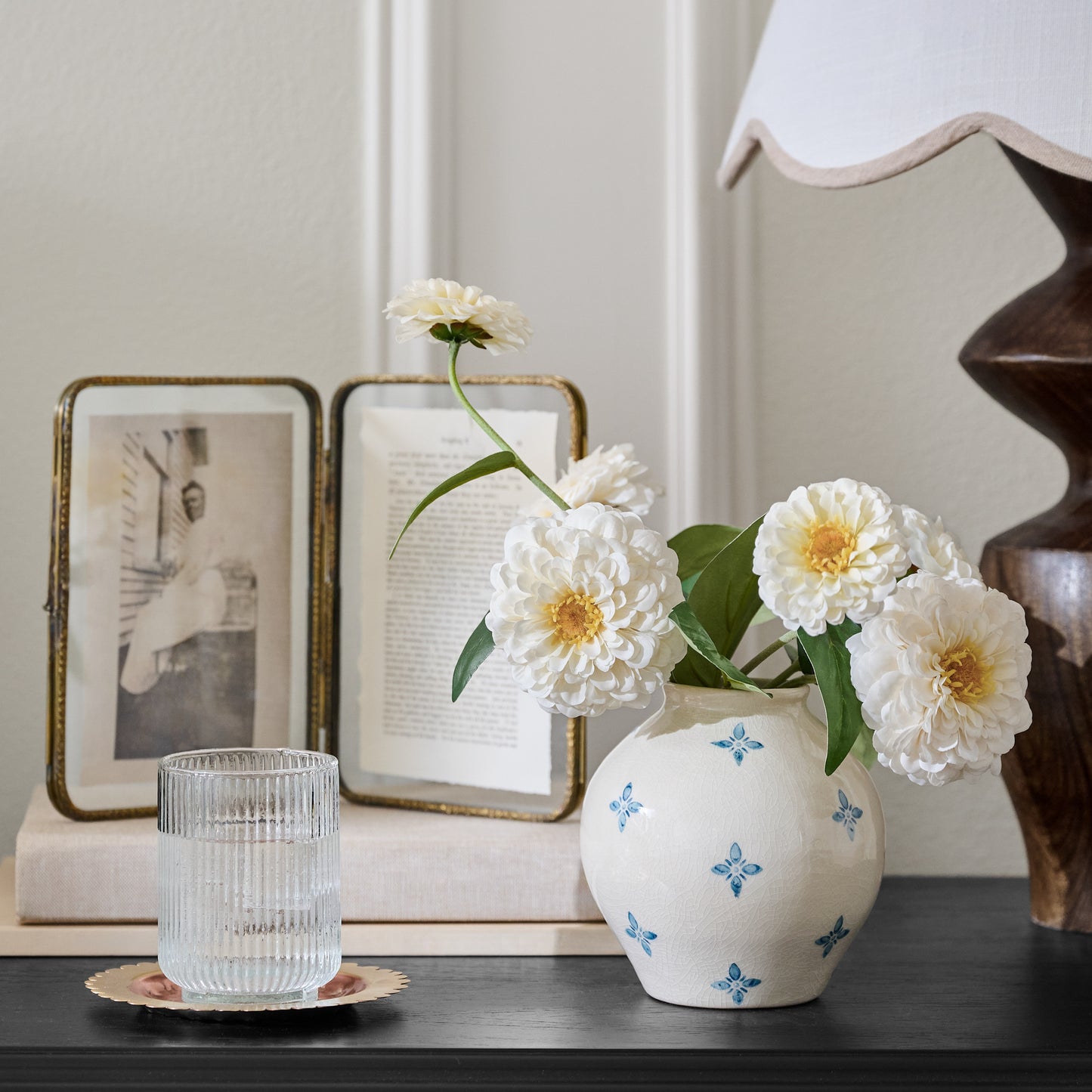 Cream and Blue Luna Bud Vase shown on nightstand with florals