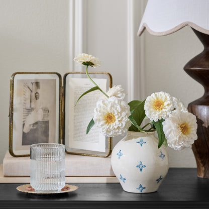 Cream and Blue Luna Bud Vase shown on nightstand with florals
