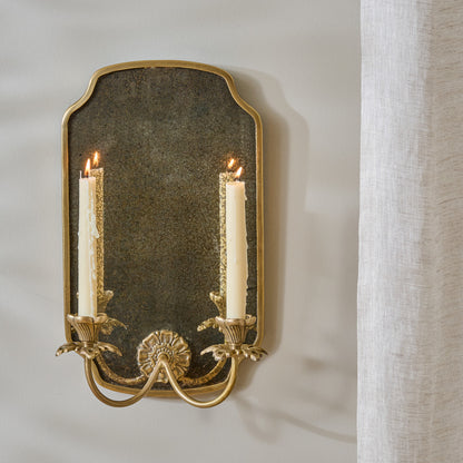 Maven Mirrored Double Wall Sconce shown styled with taper candles