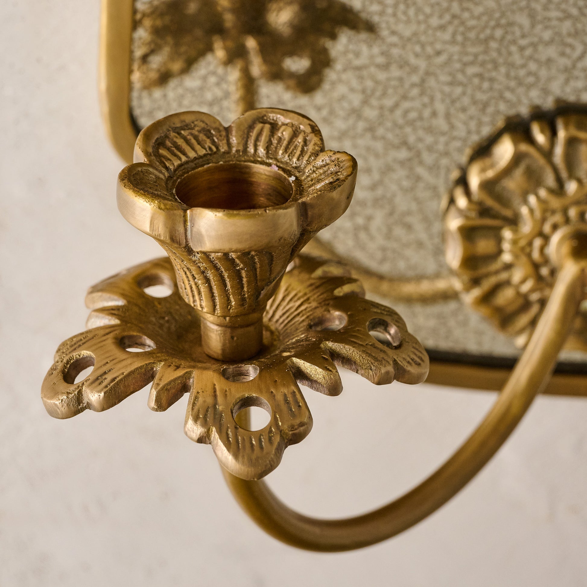 Maven Mirrored Double Wall Sconce up close shot of taper holder