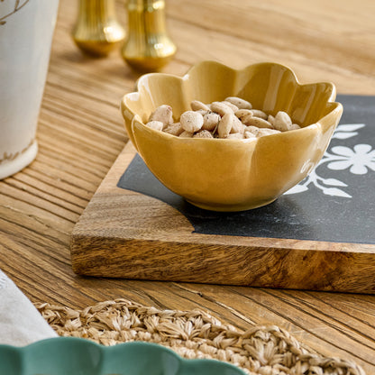 Ochre Scalloped Mini Bowl shown with nuts