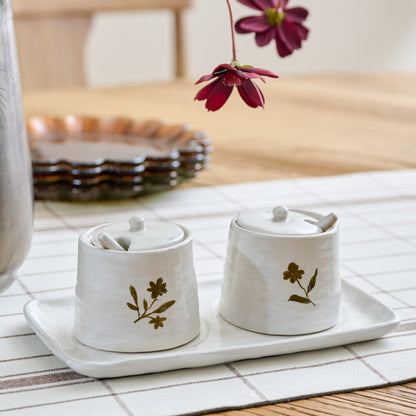 Eliana Floral Ceramic Salt + Pepper Set shown on table