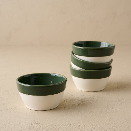 The Cottage Collection Green Rim Cereal Bowls shown stacked