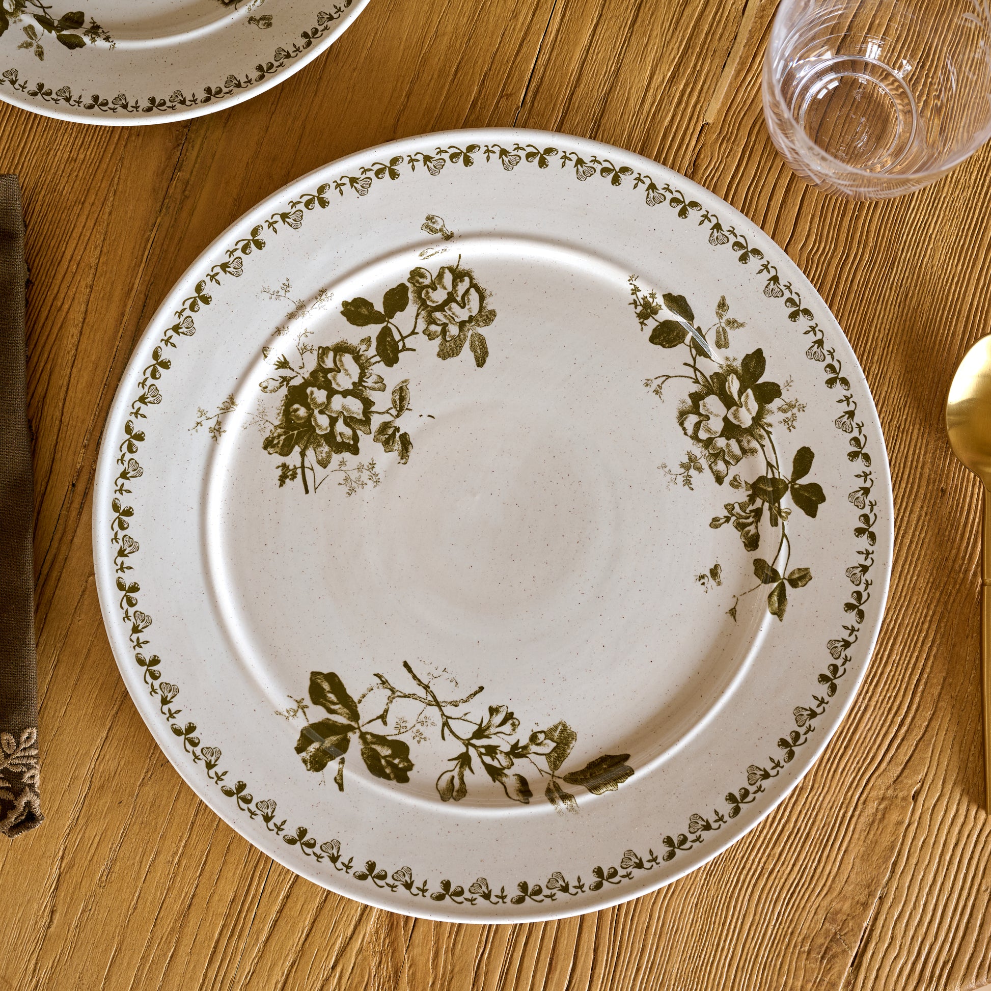 Heirloom Garden Floral Dinner Plate shown on table