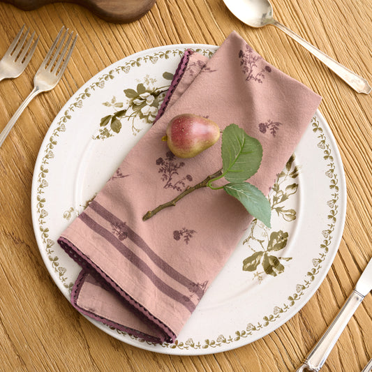 Magnolia Blush Ditsy Rose Napkin Set of Four shown on table