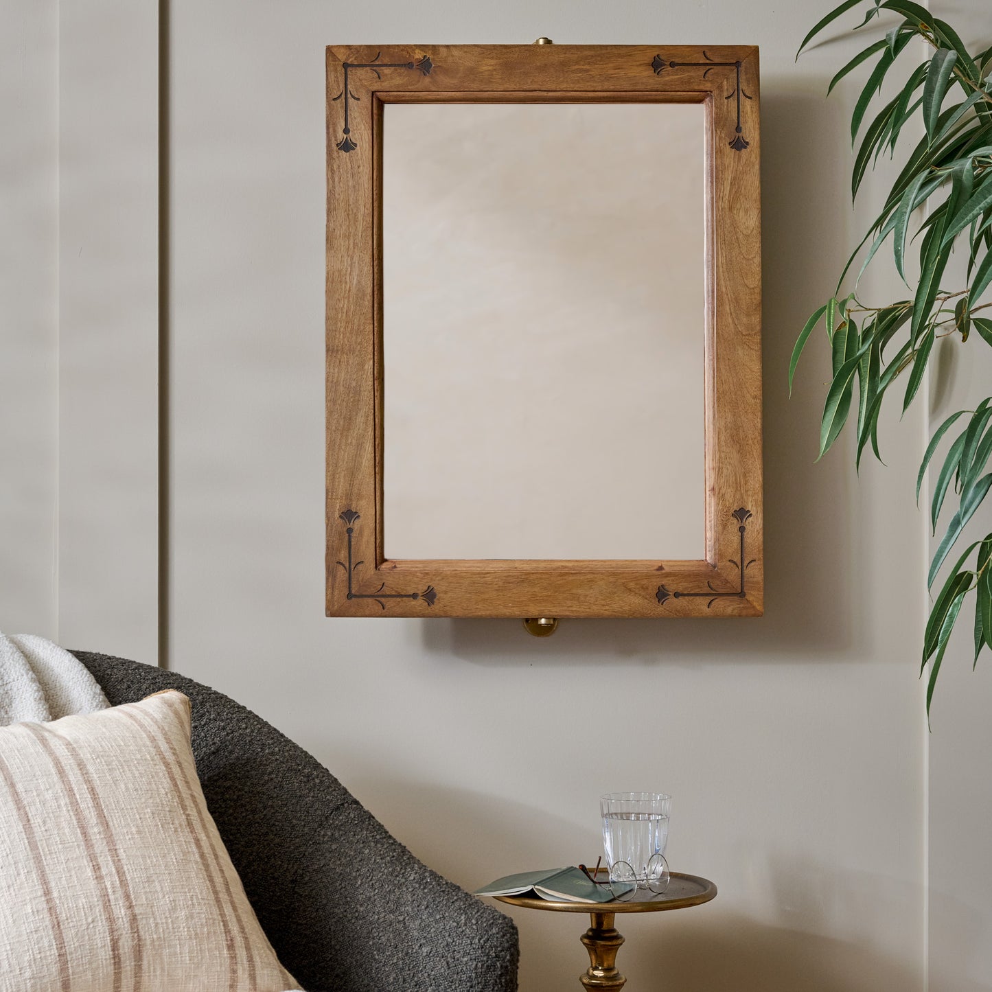 Penelope Wood and Brass Swivel Mirror shown on wall in room
