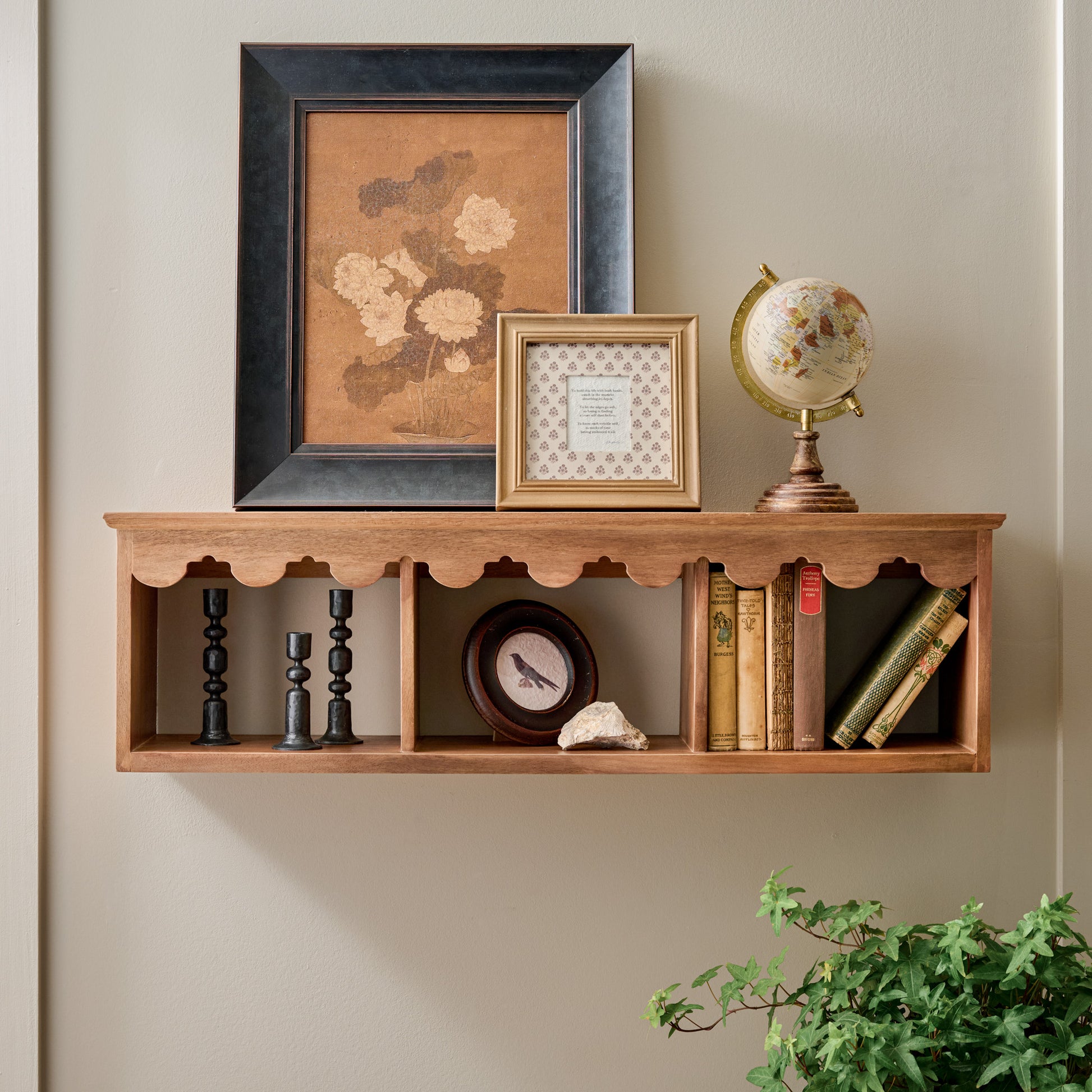 Linnea Antiqued Wood Cubby Shelf in Linnea Brown color shown styled on wall