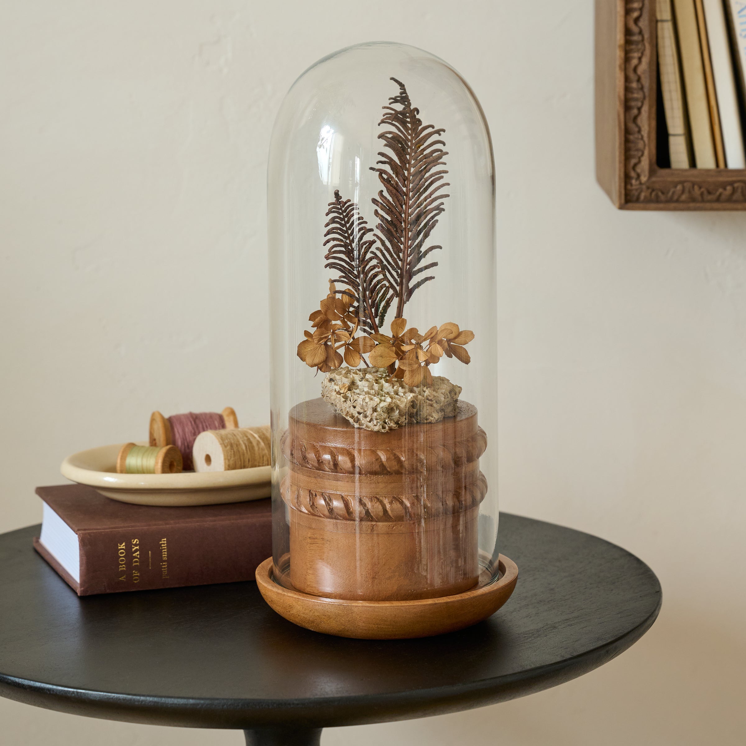 Glass Cloche with Wood Base with Riser shown displaying florals