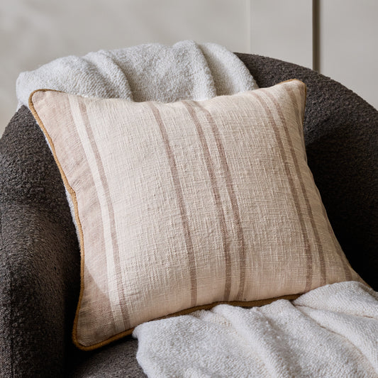 Vintage Stripe Pillow shown on accent chair