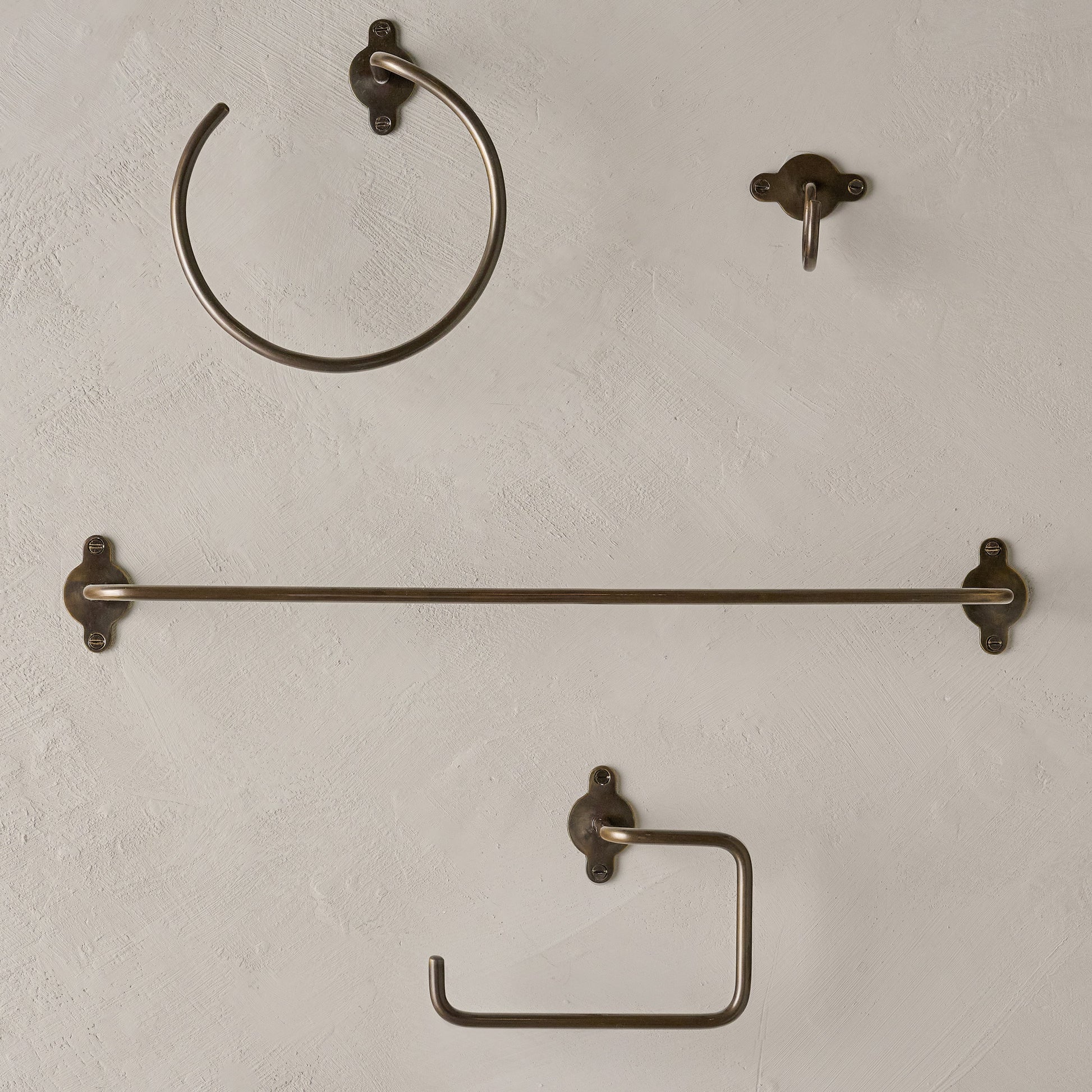 Antique Bronze Metal Toilet Paper Holder shown with other bath hardware