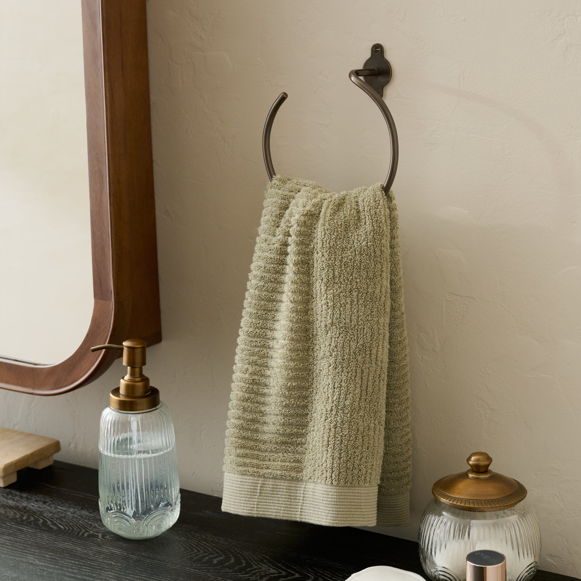 Antique Bronze Metal Towel Ring shown with towel