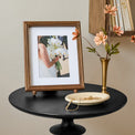 Annie Antiqued Wood Photo Frame shown styled on table