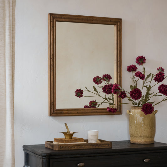 Tulip Etched Wood Framed Mirror shown hung above dresser