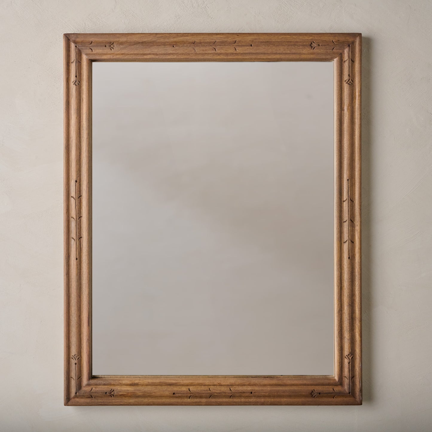 Tulip Etched Wood Framed Mirror shown hung vertically
