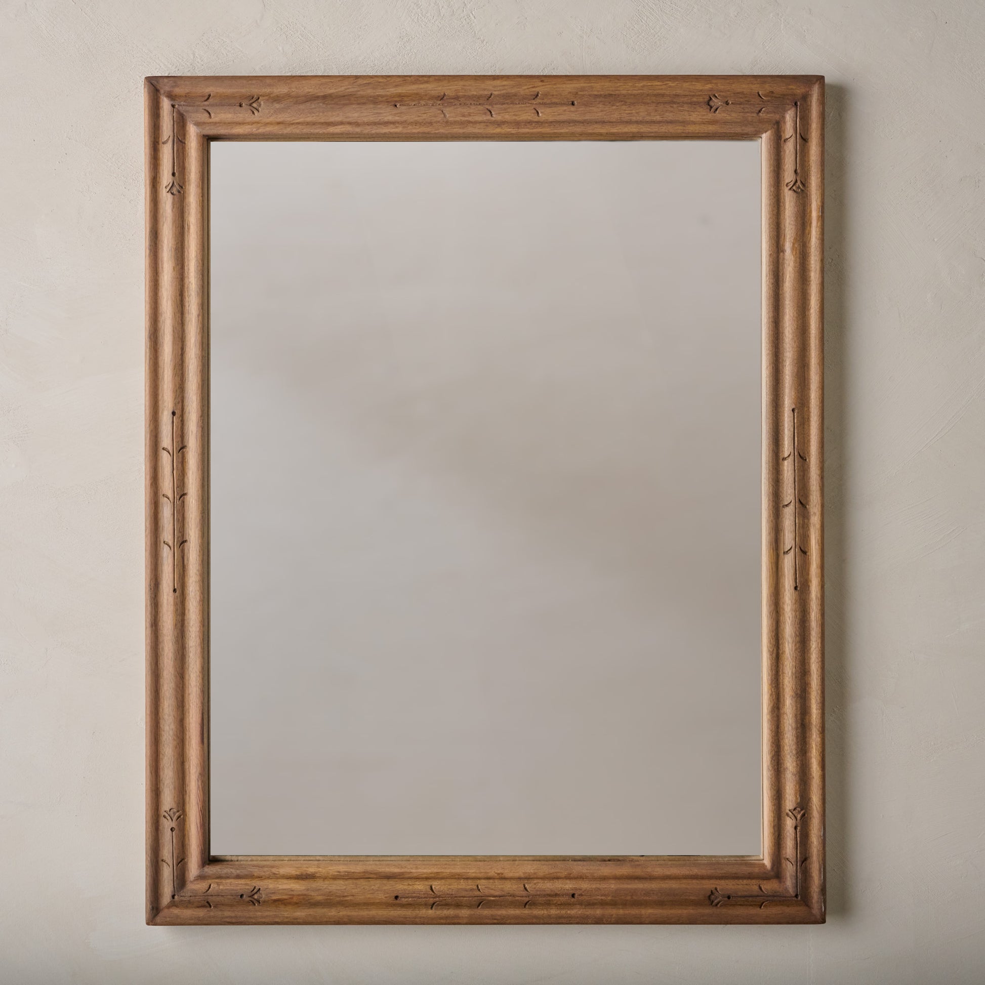 Tulip Etched Wood Framed Mirror shown hung vertically