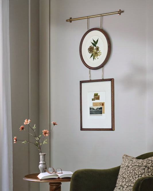 Colleen Wood and Brass Rail Multi Picture Frame shown on wall