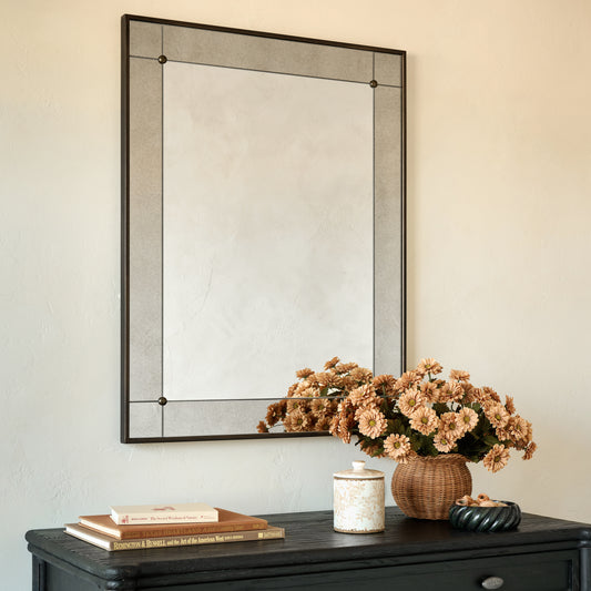 Francis Antiqued Framed Mirror shown hung above dresser