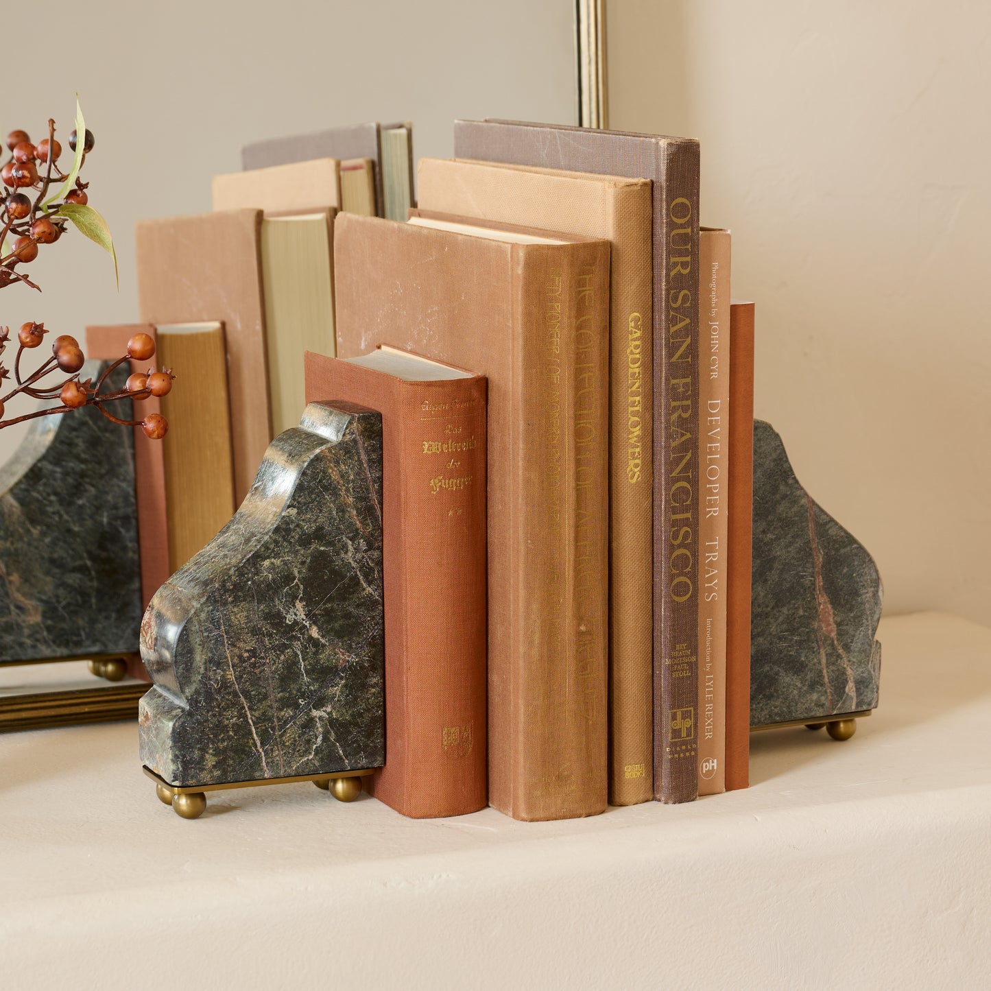 Henry Marble and Brass Bookends shown with books
