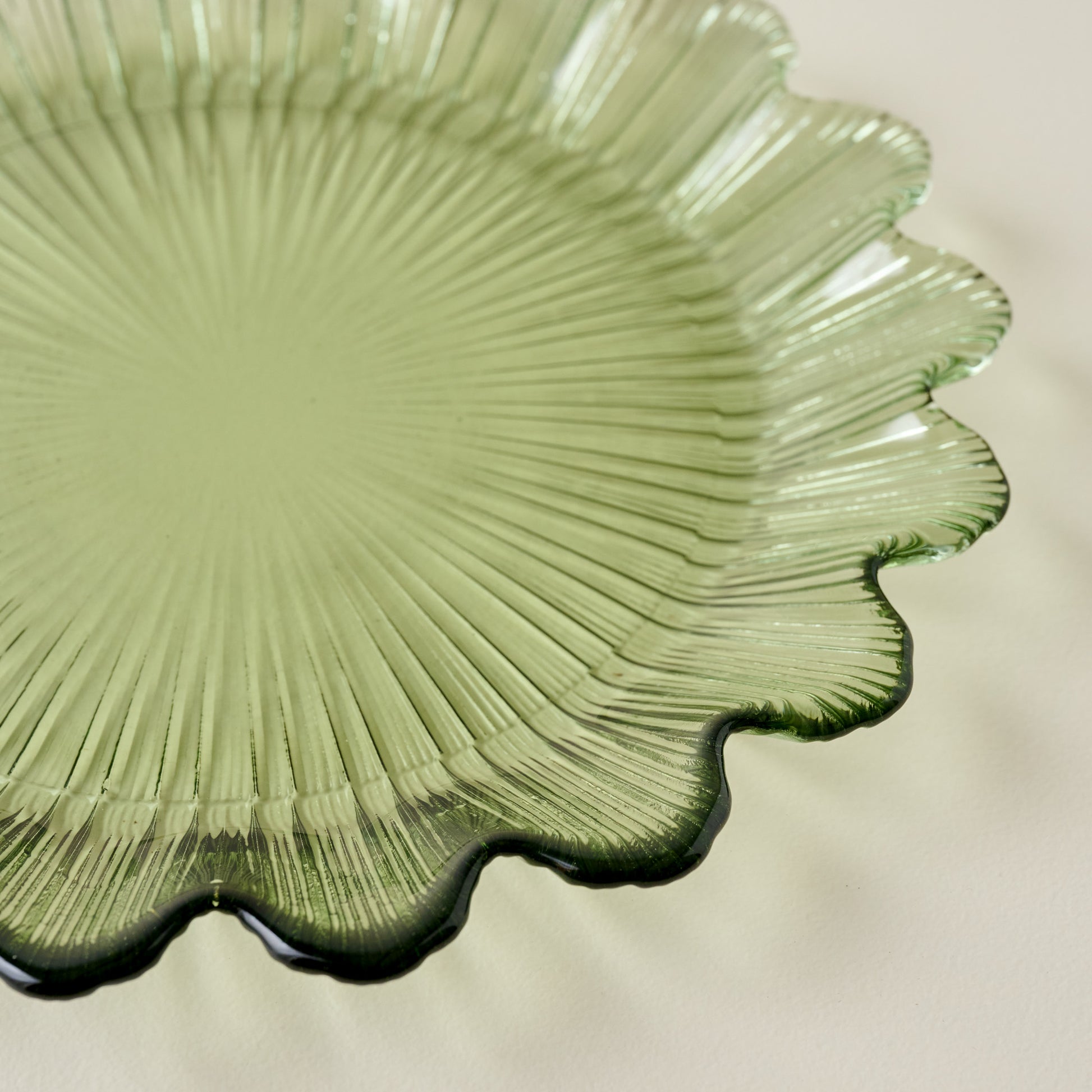 Emmeline Green Scalloped Glass Plate up close