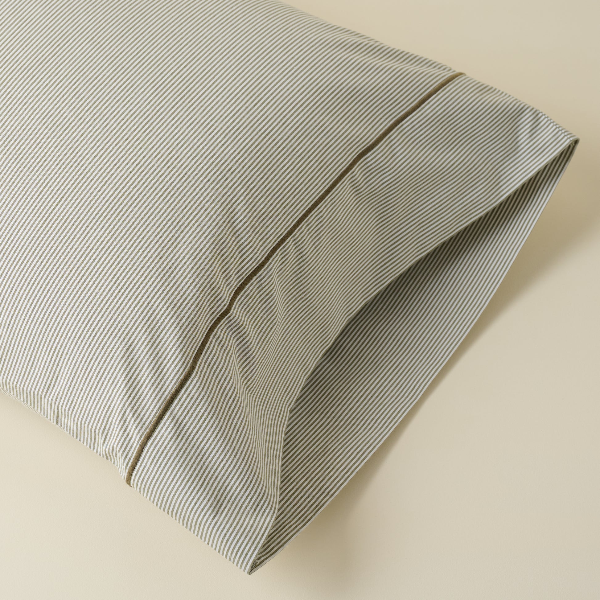 Hudson Yarn-Dyed Pinstripe Sheet Set pillow in color Winter Moss