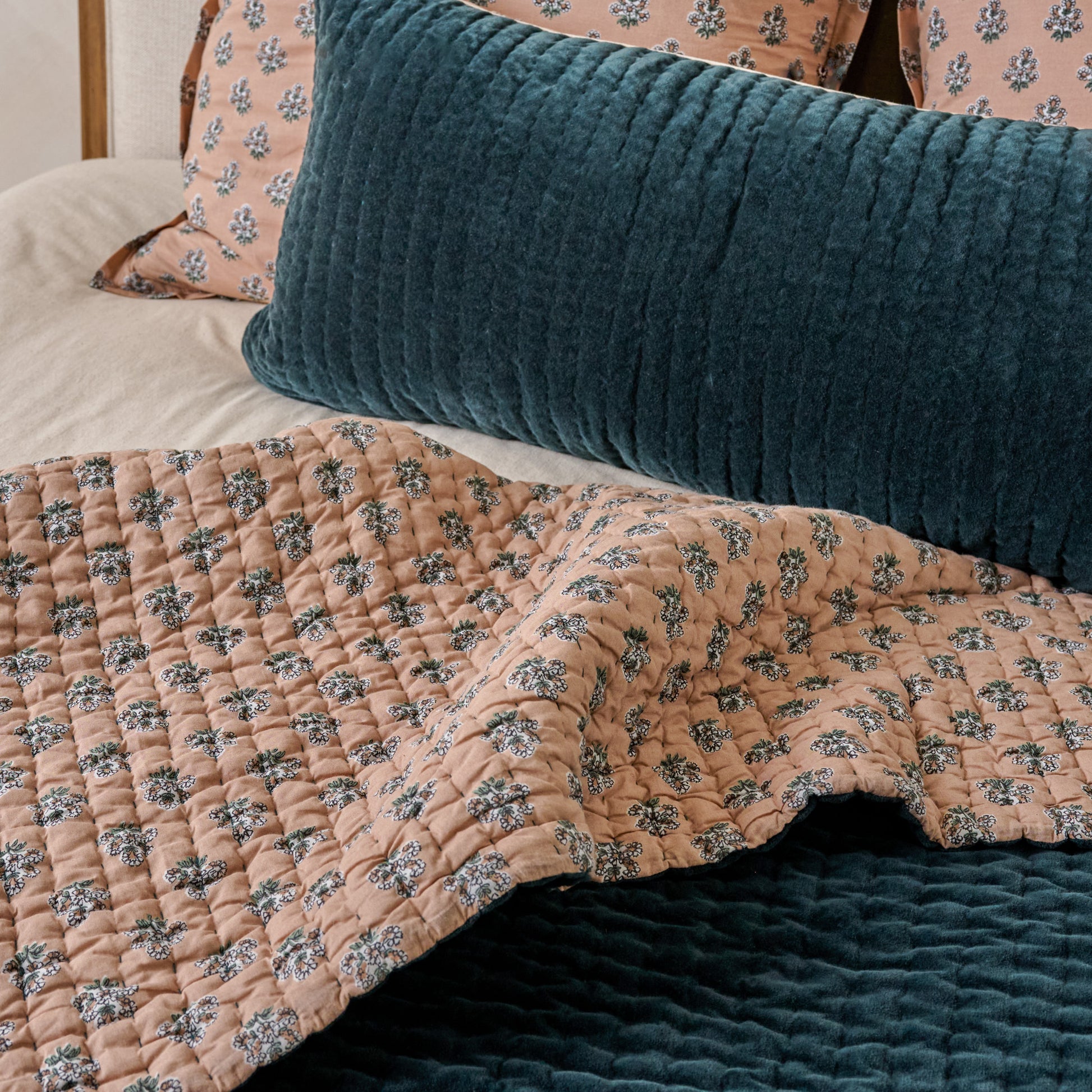Audrey Velvet Block Print Quilt - Magical Forest shown on bed turned to show reversible sides