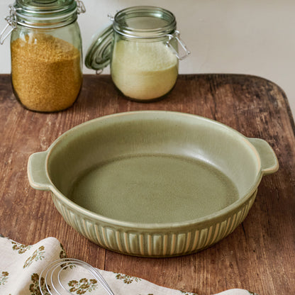 The Cottage Collection Laurel Green Round Baking Dish shown on table