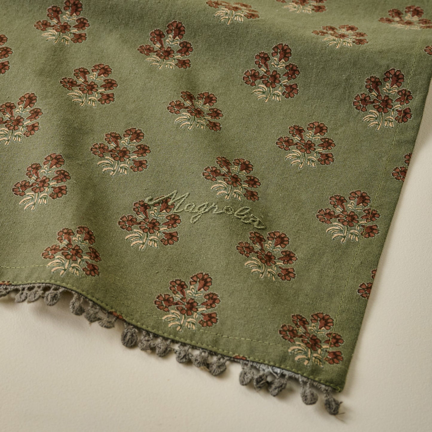 Magnolia Olive Green Block Printed Tea Towel corner up close