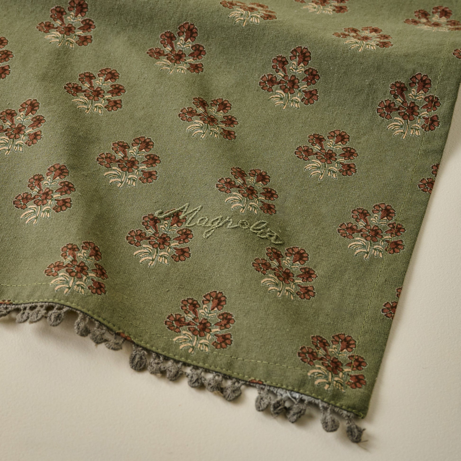 Magnolia Olive Green Block Printed Tea Towel corner up close