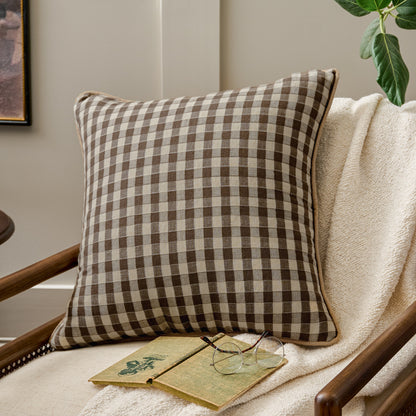 Gingham Large Pillow in Desert Palm shown on accent chair