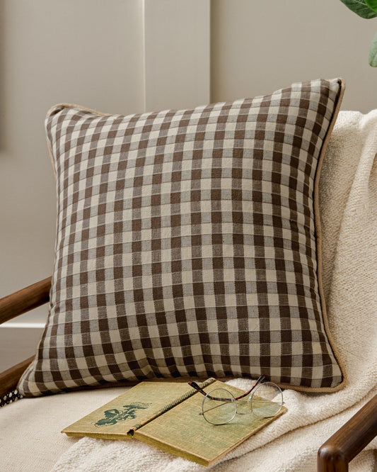 Gingham Large Pillow in Desert Palm shown on accent chair