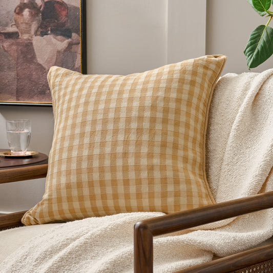 Gingham Large Pillow in Gold shown on accent chair