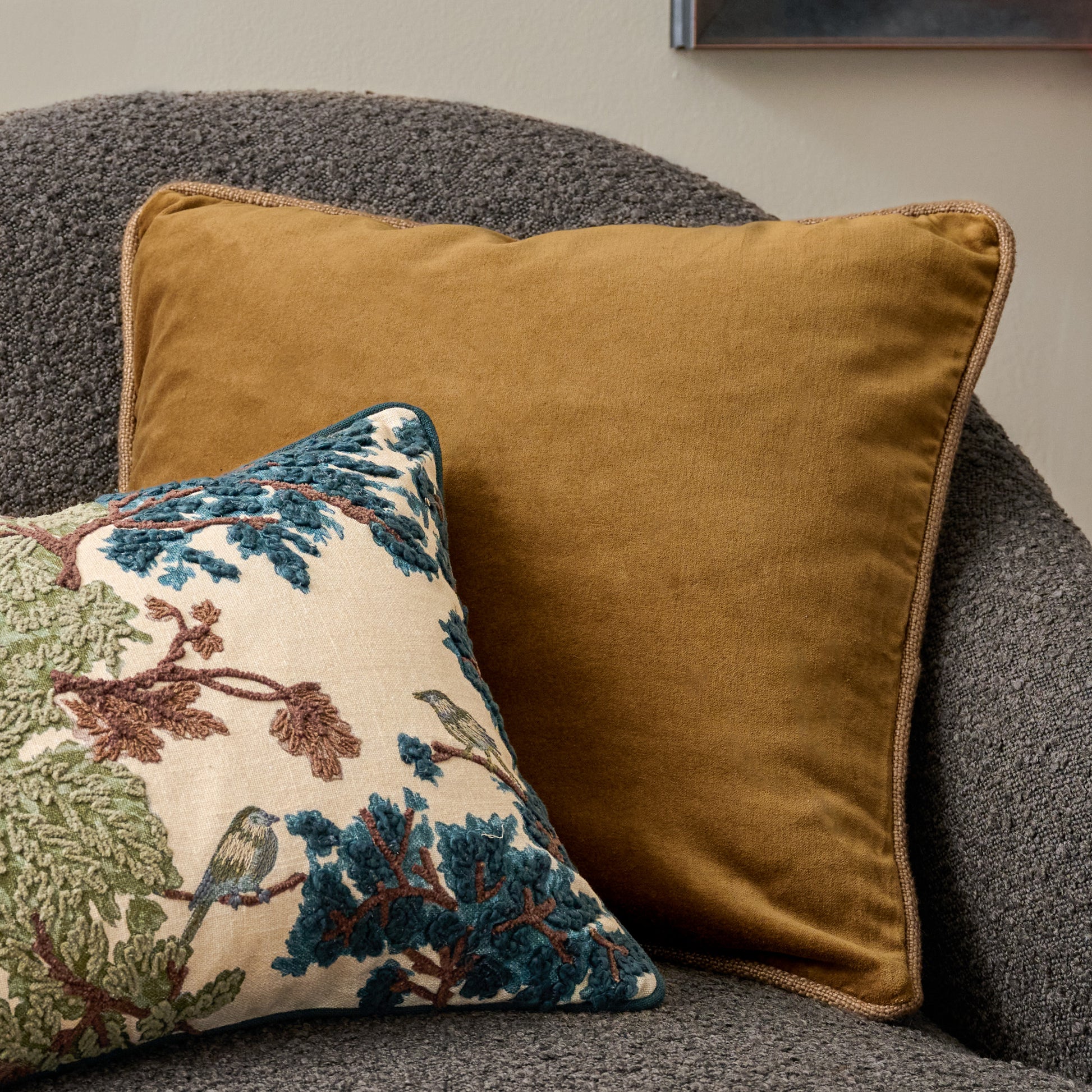 Lexie Velvet Pillow in Tan shown on accent chair