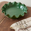 The Cottage Collection Forest Green Scalloped Pie Dish shown on table