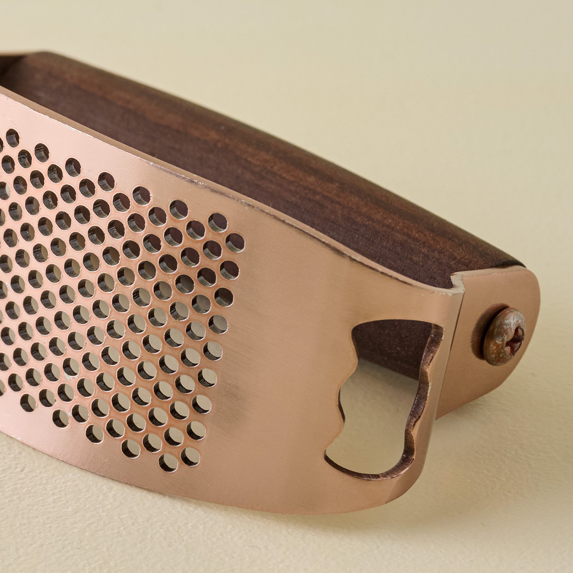 Copper + Walnut Garlic Rocker laying down zoomed in