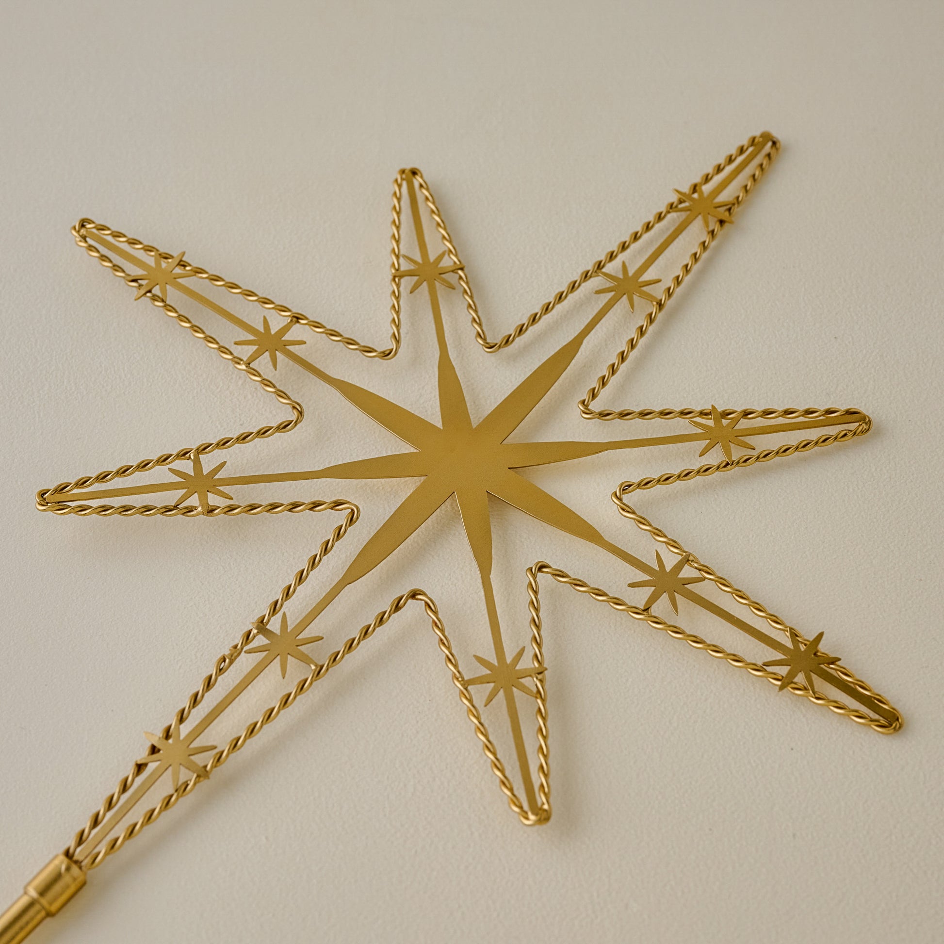 Twisted Brass Star Tree Topper up close