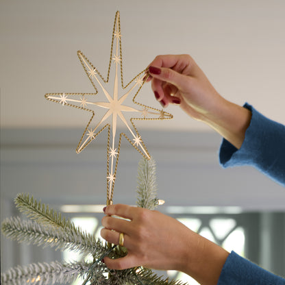 Twisted Brass Star Tree Topper in use