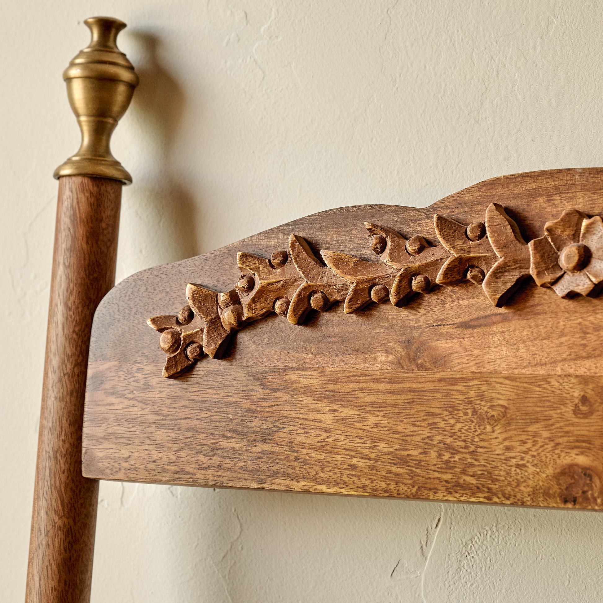 Gloria Carved Wood and Brass Decorative Ladder detail up close