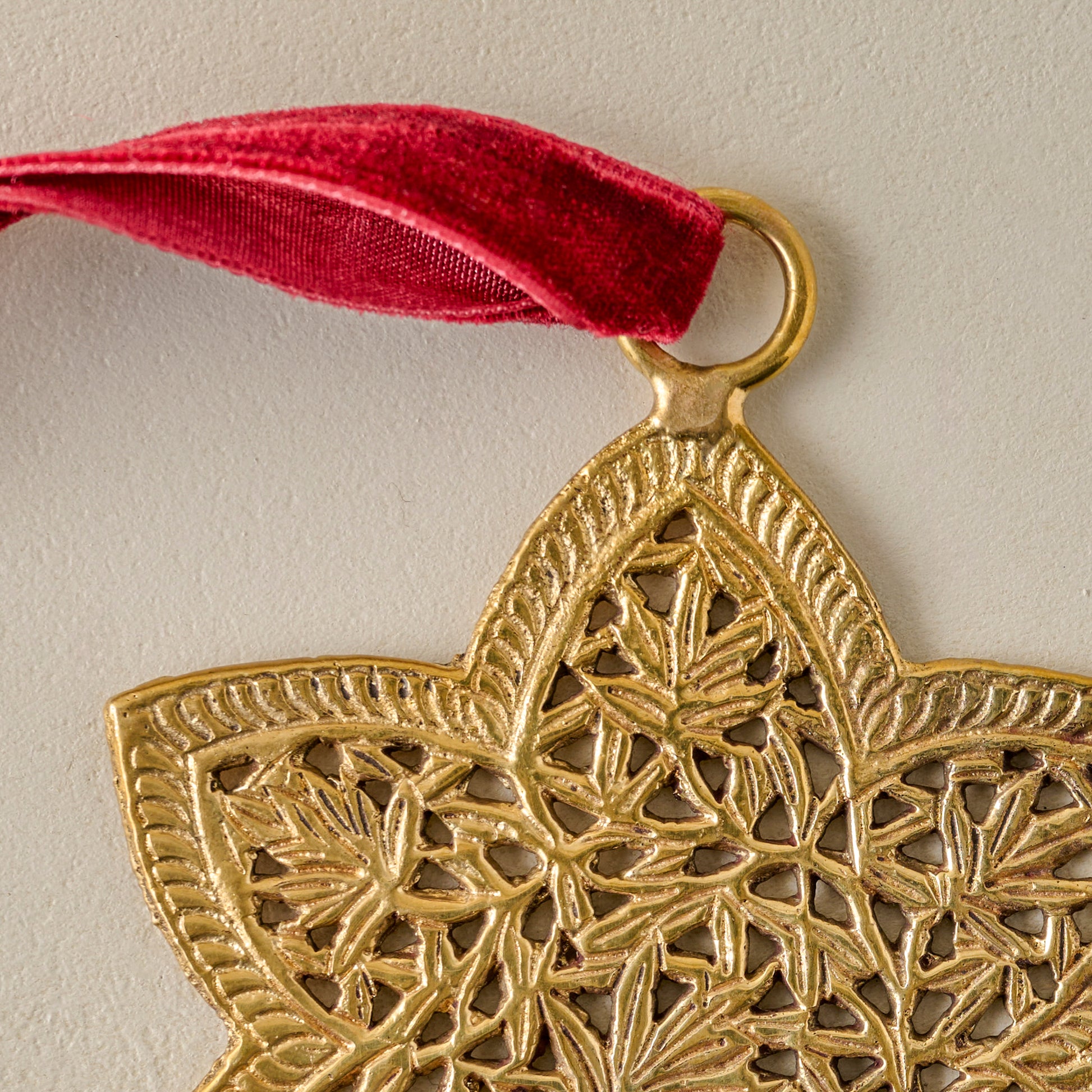 Ornate Brass Star Ornament up close