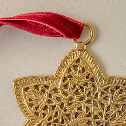 Ornate Brass Star Ornament up close