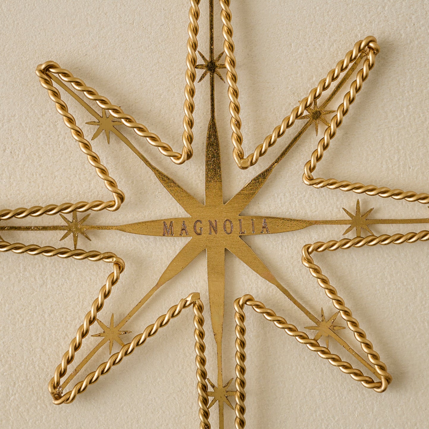 Twisted Brass Star Ornament up close