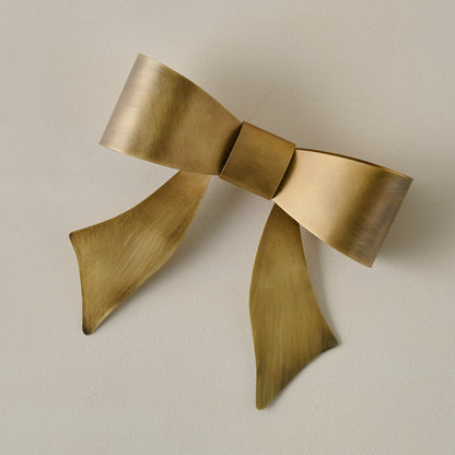 Clara Brass Bow Tree Topper