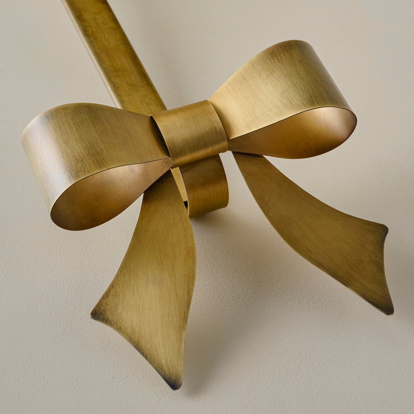 Clara Brass Bow Wreath Hanger up close