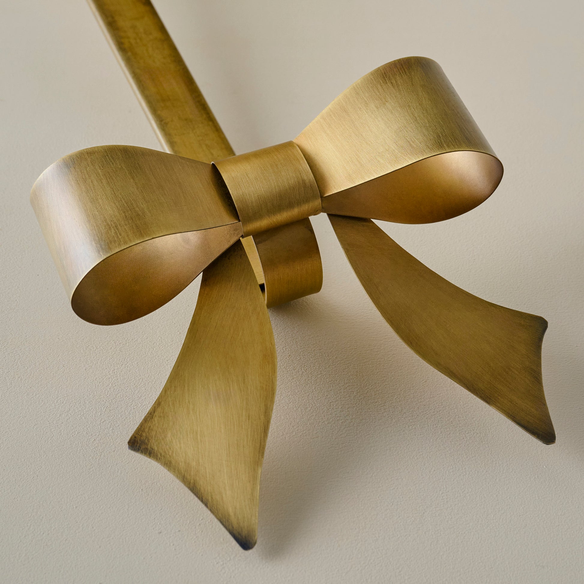 Clara Brass Bow Wreath Hanger up close