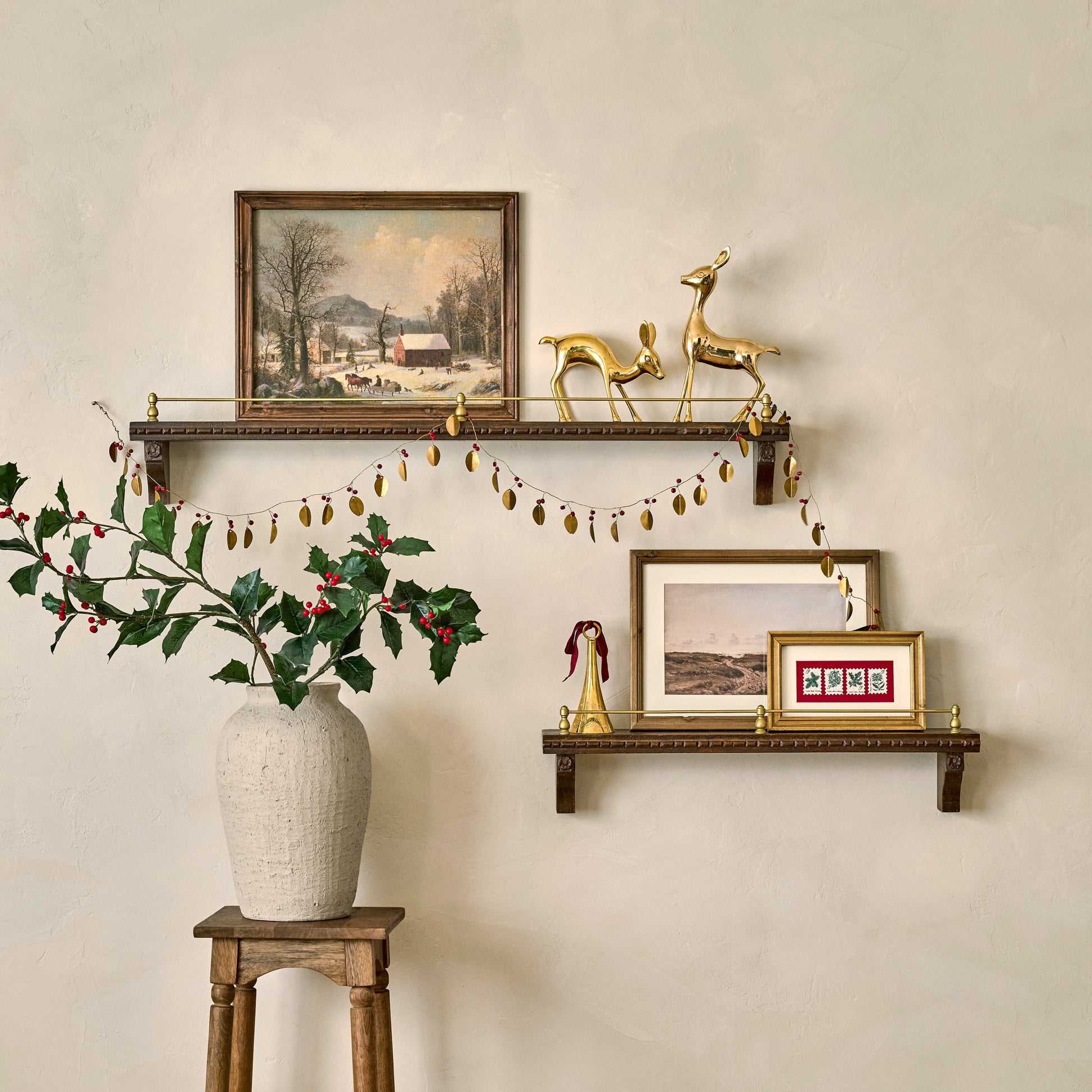 Gloria Carved Wood and Brass Picture Ledges shown together styled with seasonal decor