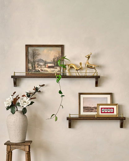 Gloria Carved Wood and Brass Picture Ledge with decor